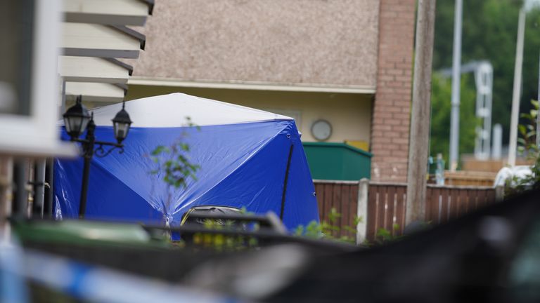 The scene in Miles Platting, Manchester, following the domestic incident where a 14-year-old boy died and his mother was injured in a "ferocious" stabbing on Thursday. A police spokesman said the suspected attacker, believed to have been known to the victims, should not be approached if seen by the public. Picture date: Friday June 10, 2022.
