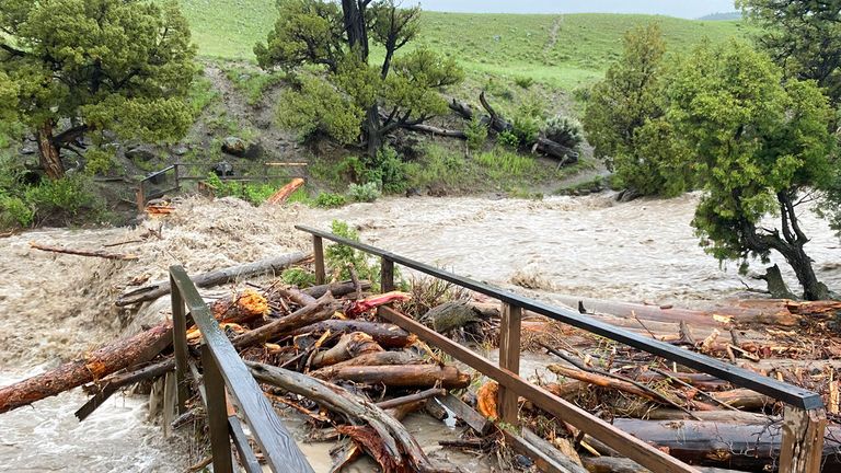 In this photo provided by the National Park Service, is a washed out bridge from flooding at Rescue Creek in Yellowstone National Park, Mont., on Monday, June 13, 2022. (National Park Service via AP)