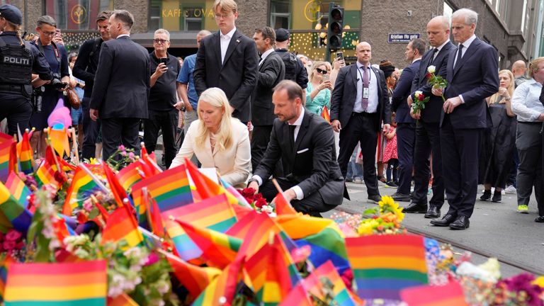Norway&#39;s Crown Prince Haakon, Crown Princess Mette-Marit and Norway&#39;s Prime Minister Jonas Gahr Stoere visit a scene of the shooting