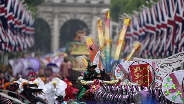People parade during the Platinum Jubilee Pageant in front of Buckingham Palace, London, on day four of the Platinum Jubilee celebrations. Picture date: Sunday June 5, 2022.
