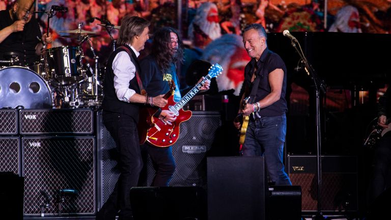 Paul McCartney, left to right, Dave Grohl and Bruce Springsteen perform at the Glastonbury Festival at Worthy Farm, Somerset, England on Saturday June 25, 2022. (Photo by Joel C Ryan/Invision/AP)