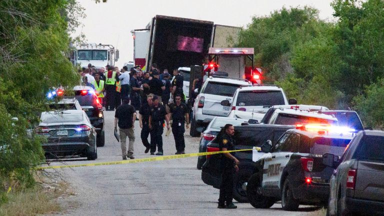 Law enforcement officers work at the scene where people were found dead inside a trailer truck in San Antonio, Texas, U.S. June 27, 2022. REUTERS/Kaylee Greenlee Beal TPX IMAGES OF THE DAY
