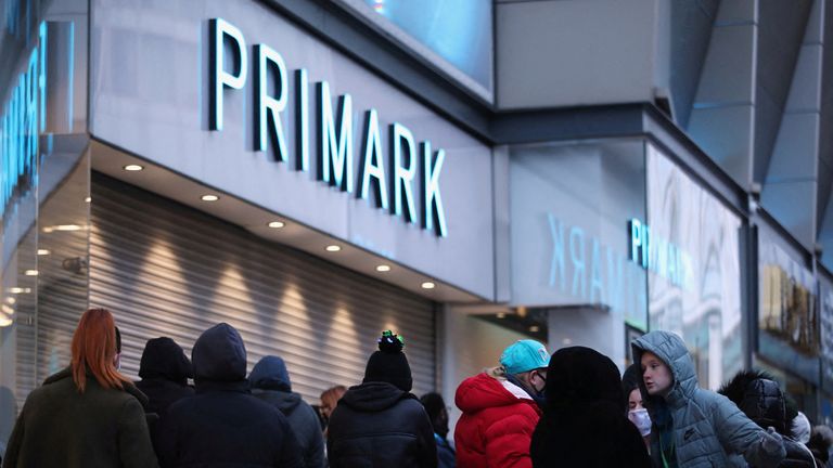 Customers queue to enter as retail store Primark in Birmingham, Britain reopens its doors after a third lockdown imposed in early January due to the ongoing coronavirus disease (COVID-19) pandemic, April 12, 2021. REUTERS/Carl Recine/File Photo
