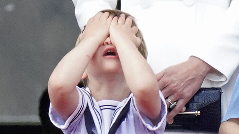 Prince Louis reacts on the balcony of Buckingham Palace, while viewing the Platinum Jubilee flypast, on day one of the Platinum Jubilee celebrations. Picture date: Thursday June 2, 2022.
