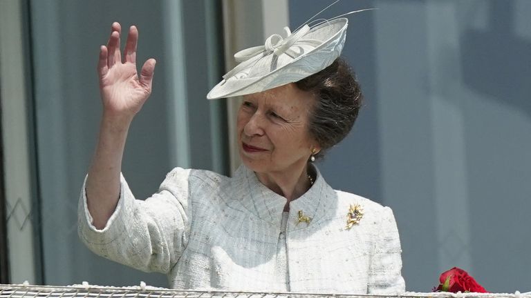 Princess Anne waves to crowds at Epsom Derby