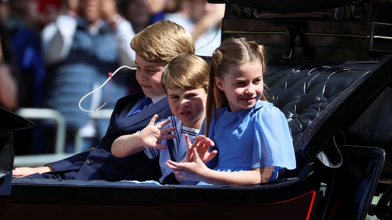 Britain&#39;s Princess Charlotte, Prince George and Prince Louis ride in a carriage during the Trooping the Colour parade in celebration of Britain&#39;s Queen Elizabeth&#39;s Platinum Jubilee, in London, Britain June 2, 2022. REUTERS/Phil Noble
