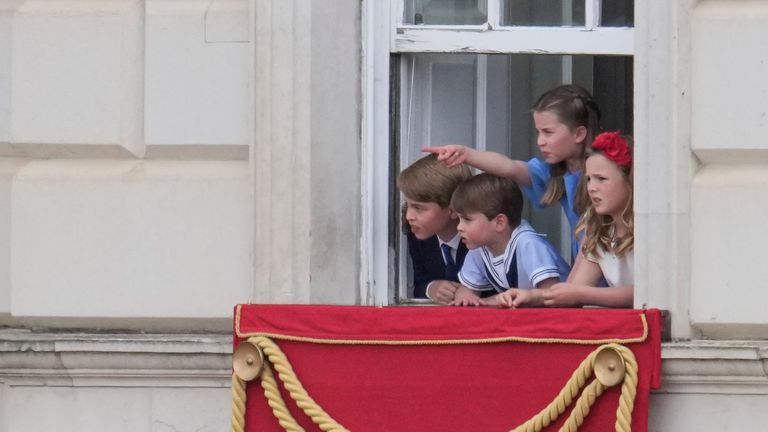 Prince George, Princess Charlotte and Prince Louis watch the Trooping of the Color in London, Thursday June 2, 2022, on the first of four days of celebrations to mark the Platinum Jubilee. The events over a long holiday weekend in the U.K. are meant to celebrate the monarch&#39;s 70 years of service. (AP Photo/Matt Dunham, Pool)
