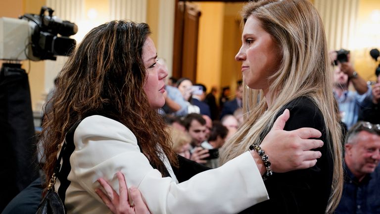 Sandra Garza, partner of deceased U.S. Capitol police officer Brian Sicknick, embraces U.S. Capitol Police officer Caroline Edwards after the hearing of the U.S. House Select Committee to Investigate the January 6 Attack on the United States Capitol was adjourned, on Capitol Hill in Washington, U.S., June 9, 2022. REUTERS/Elizabeth Frantz