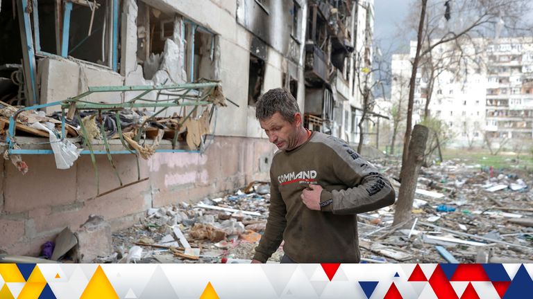 Local resident Viacheslav walks on debris of a residential building damaged by a military strike, as Russia&#39;s attack on Ukraine continues, in Severodonetsk, Luhansk region, Ukraine April 16, 2022