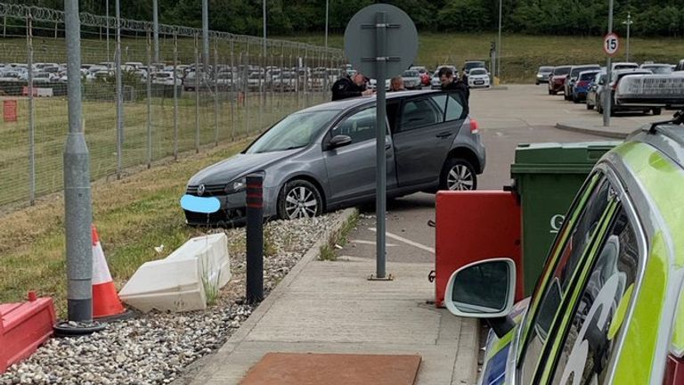 Police stop a man whose car got trapped at Stansted Airport parking