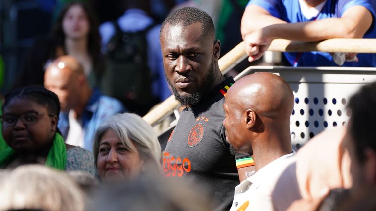 Stormzy watches a multi-faith and wreath laying ceremony on a big screen at the base of Grenfell Tower in London, in remembrance of those who died in the Grenfell Tower fire on June 14 2018. Picture date: Tuesday June 14, 2022.