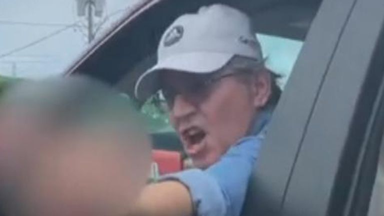 A man was arrested after he allegedly hurled racial slurs at a father and son during a road rage incident in New York on 11 June