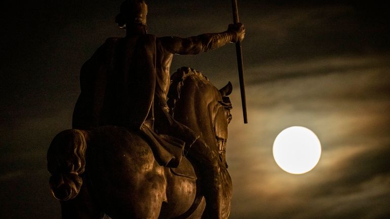 A supermoon rises behind sculpture of Tomislav of Croatia, the first Croatian king, in downtown Zagreb, Croatia, Tuesday, June 14, 2022. The moon reached its full stage on Tuesday, during a phenomenon known as a supermoon because of its proximity to Earth, and it is also labeled as the "Strawberry Moon" because it is the full moon at strawberry harvest time. (AP Photo/Darko Bandic)
PIC:AP