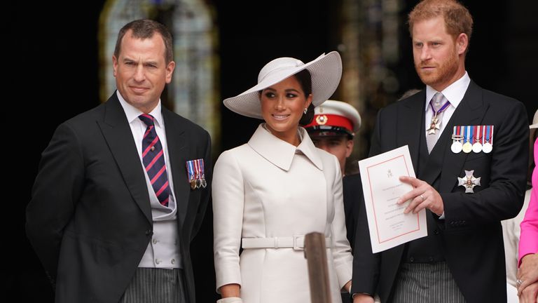 Peter Phillips (left), the Duchess of Sussex and Duke of Sussex leave the National Service of Thanksgiving at St Paul&#39;s Cathedral, London, on day two of the Platinum Jubilee celebrations for Queen Elizabeth II. Picture date: Friday June 3, 2022.
