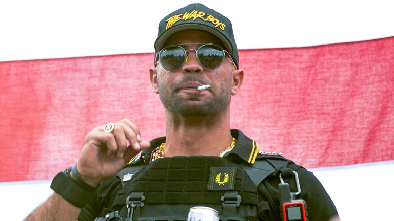 FILE - Proud Boys leader Henry "Enrique" Tarrio wears a hat that says The War Boys during a rally in Portland, Ore., Sept. 26, 2020. Tarrio, the former top leader of the Proud Boys, will remain jailed while awaiting trial on charges that he conspired with other members of the far-right extremist group to attack the U.S. Capitol and stop Congress from certifying President Joe Biden&#39;s 2020 electoral victory, a federal judge has ruled. (AP Photo/Allison Dinner, File)