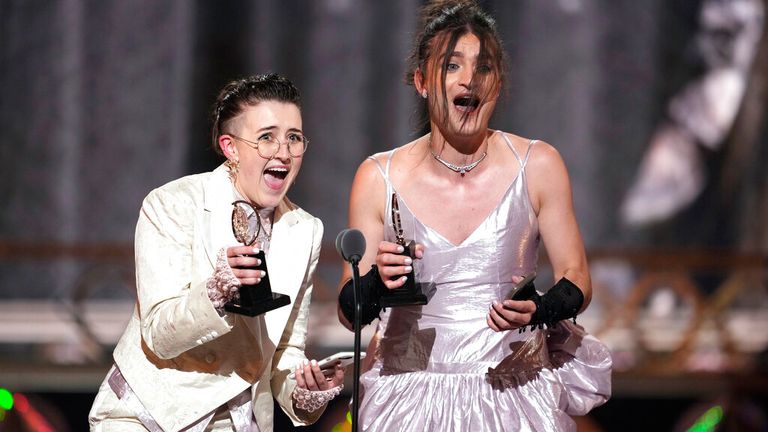 Lucy Moss, left, and Toby Marlow accept the award for best original score for Six: The Musical at the 75th annual Tony Awards on Sunday, June 12, 2022, at Radio City Music Hall in New York. (Photo by Charles Sykes/Invision/AP)