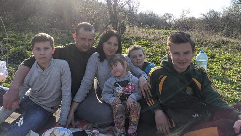 Yurii Berlizov and his wife Maryna Berlizova  with some of their children. Mr Berlizov was killed on the first day of the Ukraine war. He was a soldier.