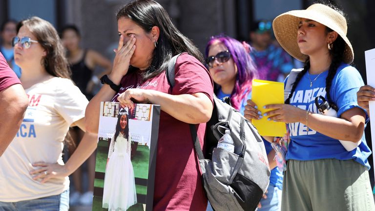 Gloria Cazares, mother of Jackie Cazares, who was killed in the Robb Elementary School shooting in Uvalde, Texas, listens to speakers during a "March for our lives" rally, one of a series of nationwide protests against gun violence, in Austin, Texas, U.S., June 11, 2022. REUTERS/Nuri Vallbona