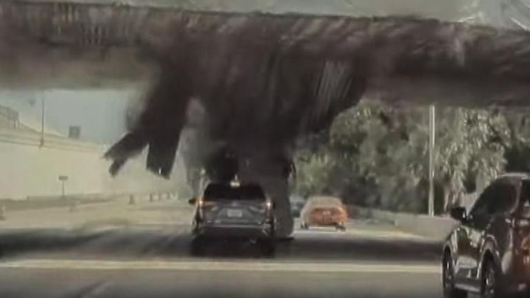 Dashcam footage shows a van smashing into an overpass in Florida.