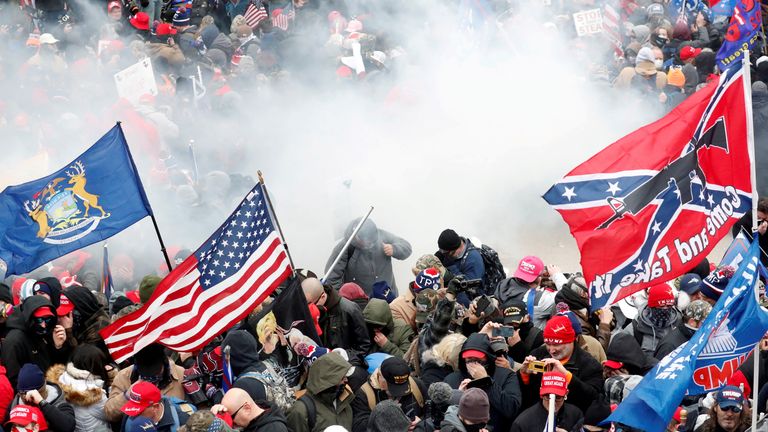 Tear gas is released into a crowd of protesters during clashes with Capitol Police during a rally at the U.S. Capitol in Washington, U.S., on January 6, 2021, over the U.S. Congress over the results of the 2020 U.S. presidential election certified.REUTERS/Shannon Stapleton/File Photo