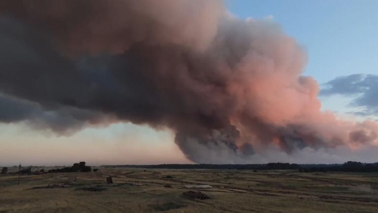 Emergency crews were seen attacking wildfires from the air and land in southern Siberia