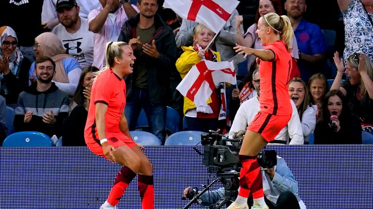 Lauren Hemp celebrates with Beth Mead for England