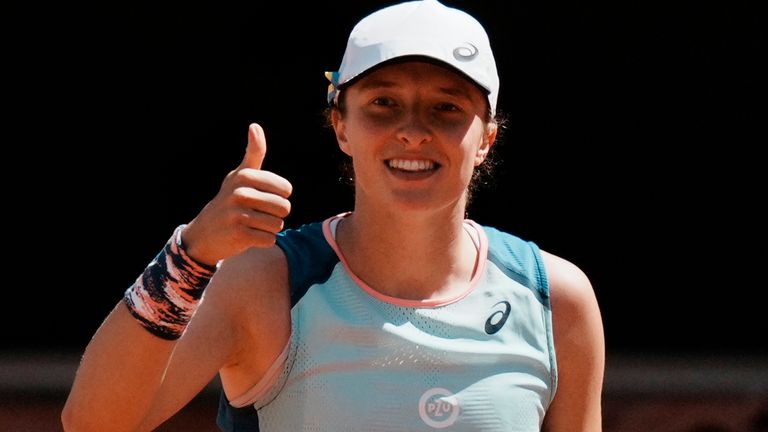 Poland&#39;s Iga Swiatek thumbs up after defeating Jessica Pegula of the U.S. during their quarterfinal match of the French Open tennis tournament at the Roland Garros stadium Wednesday, June 1, 2022 in Paris. Swiatek won 6-3, 6-2. (AP Photo/Thibault Camus)