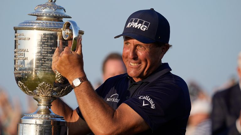 Phil Mickelson holds the Wanamaker Trophy after winning the PGA Championship golf tournament on the Ocean Course in Kiawah Island, S.C. Mickelson will try to complete the career Grand Slam on June 17-20 at the U.S. Open at Torrey Pines. 