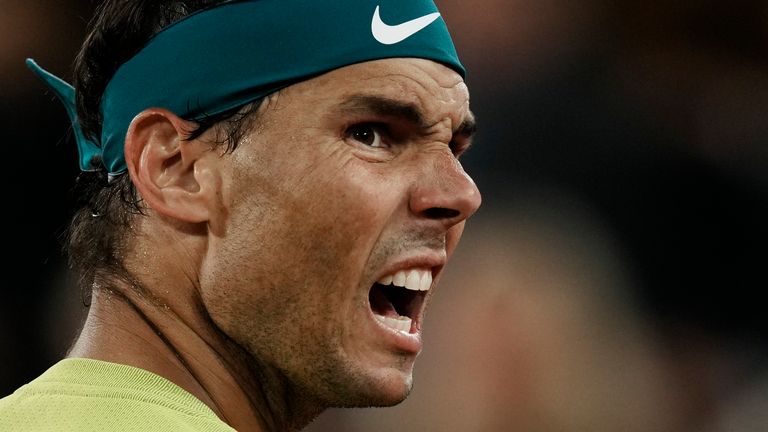 Spain&#39;s Rafael Nadal reacts after missing a point as he plays Serbia&#39;s Novak Djokovic during their quarterfinal match of the French Open tennis tournament at the Roland Garros stadium Tuesday, May 31, 2022 in Paris. (AP Photo/Thibault Camus)