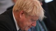 Britain&#39;s Prime Minister Boris Johnson checks his notes at the start of a cabinet meeting, in Downing Street, London, Tuesday, July 5, 2022. 