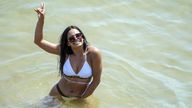 Marisa Santos cools off in the sea in Bournemouth. Britons are set to melt on the hottest UK day on record as temperatures are predicted to hit 40C. Picture date: Tuesday July 19, 2022.
