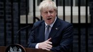People listen as British Prime Minister Boris Johnson makes a statement at Downing Street in London, Britain, July 7, 2022. REUTERS/Maja Smiejkowska
