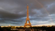 A rainbow appears at the Eiffel Tower in Paris