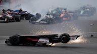 Alfa Romeo driver Guanyu Zhou of China crashes at the start of the British Formula One Grand Prix at the Silverstone circuit, in Silverstone, England, Sunday, July 3, 2022. (AP Photo/Frank Augstein)
