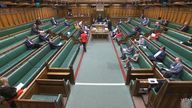 Wet patches are seen on the carpet of the chamber of the House of Commons, London, after the sitting was delayed for 60 minutes as numerous buckets near the green benches were catching drips raining in through the ceiling on Monday afternoon. Picture date: Monday July 11, 2022.

