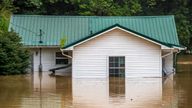 Home have been flooded by Lost Creek in Kentucky. Pic: AP