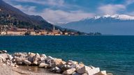 A scenic view of a town on the shores of Lago di Garda. Sald, Lago di Garda, Lombardia, Italy.