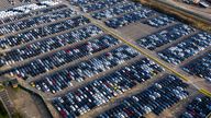 Aerial view car ship, New Cars produced up in the port for ship and import-export united kingdom 