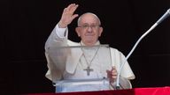 Pope Francis waving at the Vatican
