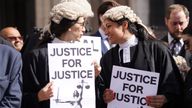 Criminal defence barristers gather outside the Royal Courts of Justice in London to support the ongoing Criminal Bar Association (CBA) action over Government set fees for legal aid advocacy work. Picture date: Monday July 4, 2022.
