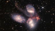 Stephan’s Quintet, a visual grouping of five galaxies, is best known for being prominently featured in the holiday classic film, “It’s a Wonderful Life.” Today, NASA’s James Webb Space Telescope reveals Stephan’s Quintet in a new light.