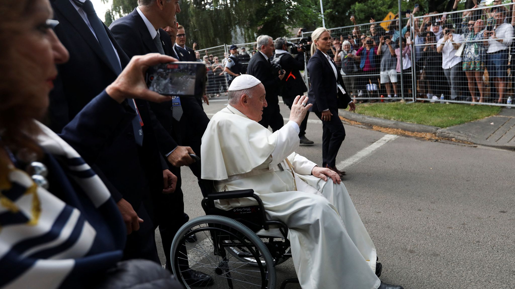 Pope Francis dons feathered headdress as he apologises for Catholic ...