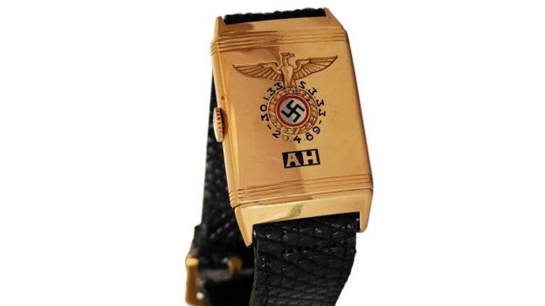 The Huber timepiece bears a swastika, Nazi eagle and the initials AH. Pic: Alexander Historical Auctions