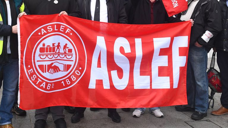 File photo dated 13/12/2016 of a flag on an Aslef picket line. Train drivers at eight rail companies are to stage a 24-hour Saturday strike later this month in pay disputes, threatening more disruption to services. Members of Aslef at Arriva Rail London, Chiltern Railways, Greater Anglia, Great Western, Hull Trains, LNER, Southeastern and West Midlands Trains will walk out on July 30. Issue date: Thursday July 14, 2022.
