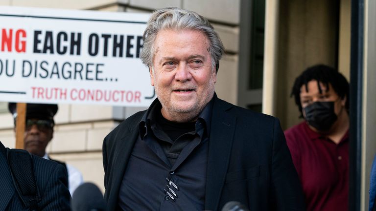 Former White House strategist Steve Bannon, center, walks to speak with reporters as he departs federal court on Friday, July 22, 2022, in Washington. Accompanying Bannon are his attorneys David Schoen, left, and M. Evan Corcoran.  Bannon, a longtime ally of former President Donald Trump has been convicted of contempt charges for defying a congressional subpoena from the House committee investigating the Jan. 6 insurrection at the U.S. Capitol. (AP Photo/Alex Brandon)