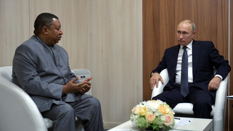 Mr Barkindo with President Putin in 2018; he brought Russia into the enlarged OPEC+ group