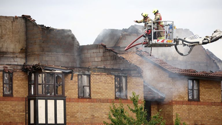 Firefighters tackle a fire at Redwood Grove following a gas explosion, in Bedford, Britain, July 4, 2022. REUTERS/Henry Nicholls
