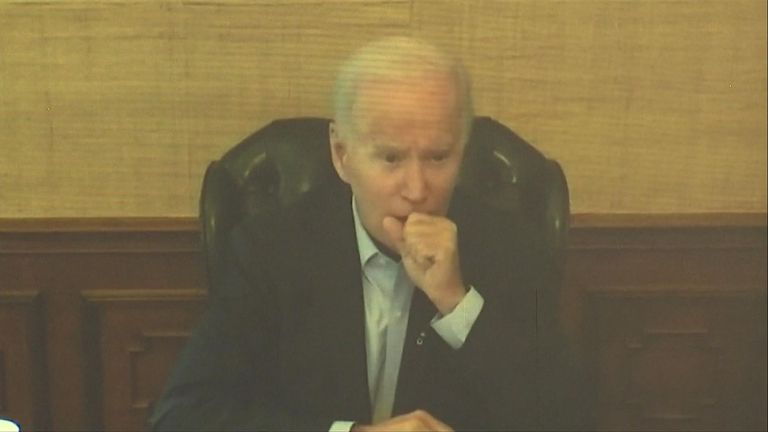 Biden attended a meeting with his economic team virtually, on a large screen, after testing positive for COVID on Thursday.