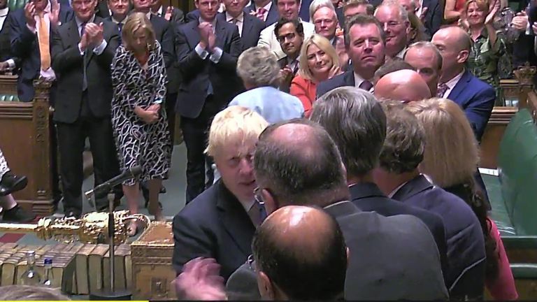 Boris Johnson leaves to applause 