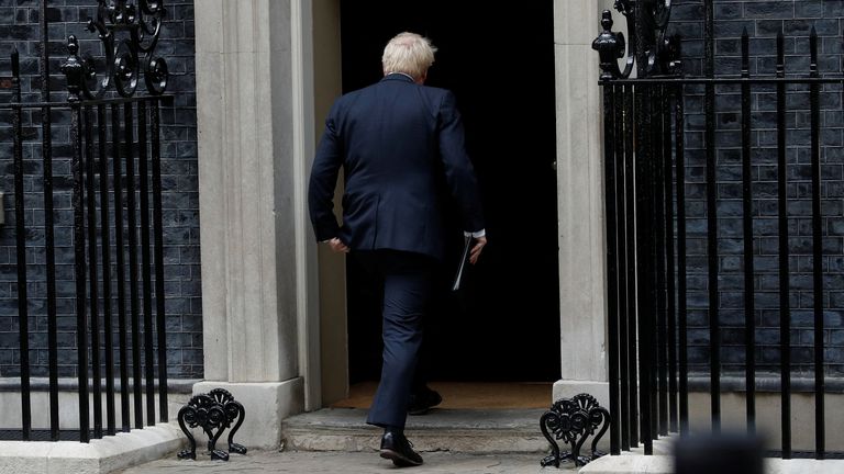 British Prime Minister Boris Johnson leaves after making a statement at Downing Street in London, Britain, July 7, 2022. REUTERS/Peter Nicholls